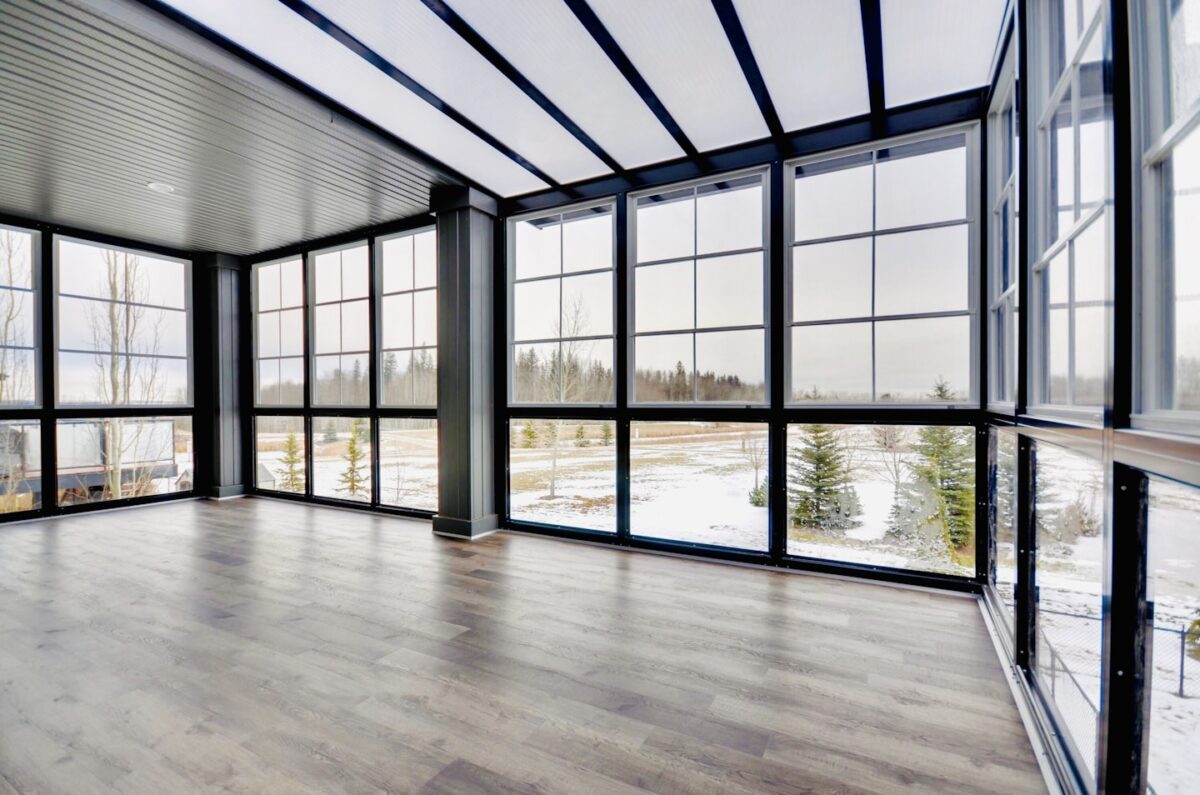 Empty bright room ready for yoga classes, showing space layout, openness, and suitability for studio operations